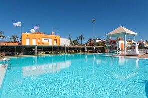 2 outdoor pools, pool loungers, lifeguards on site