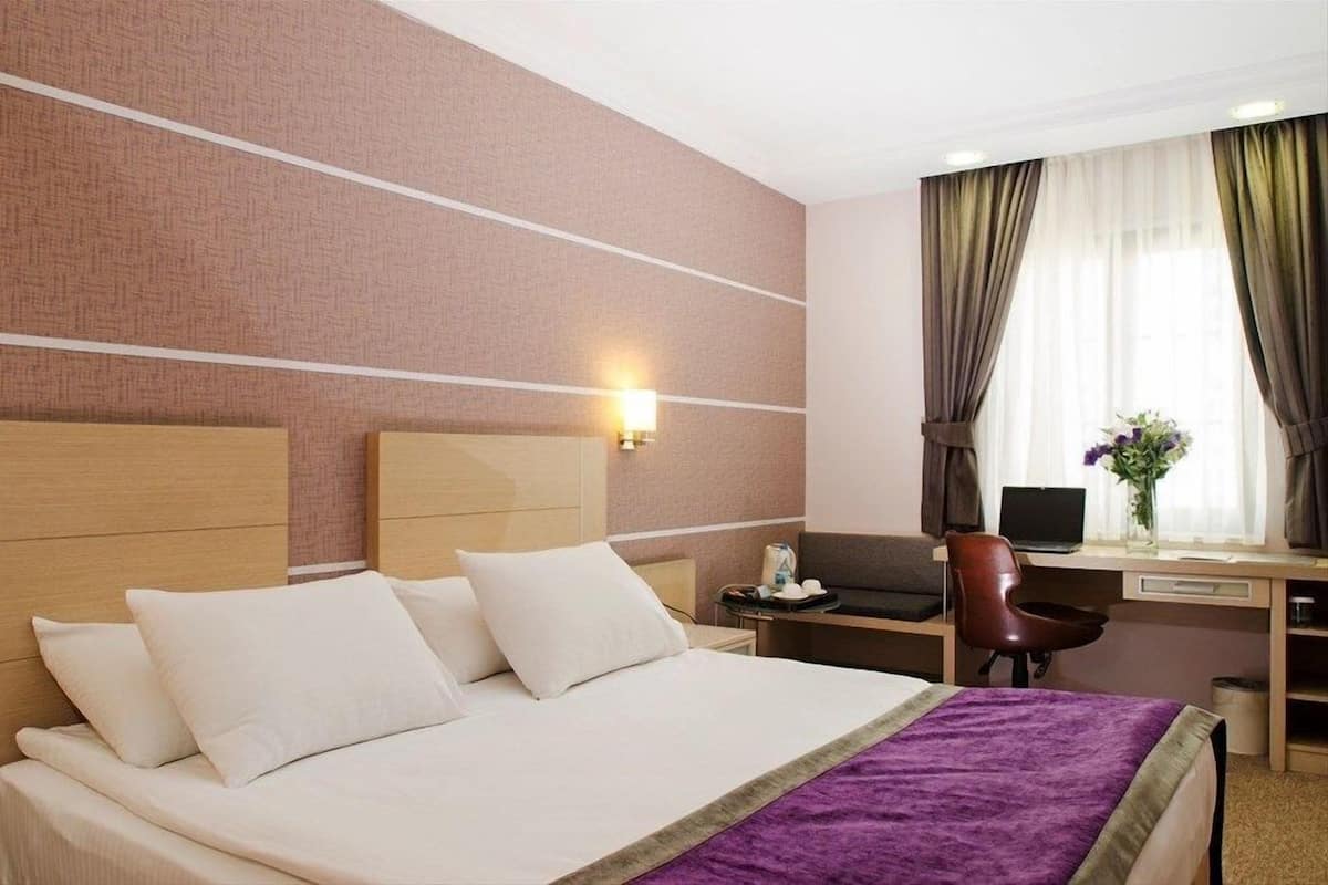 Premium bedding, minibar, in-room safe, desk