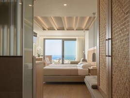 Sábanas de algodón egipcio y caja de seguridad en la habitación