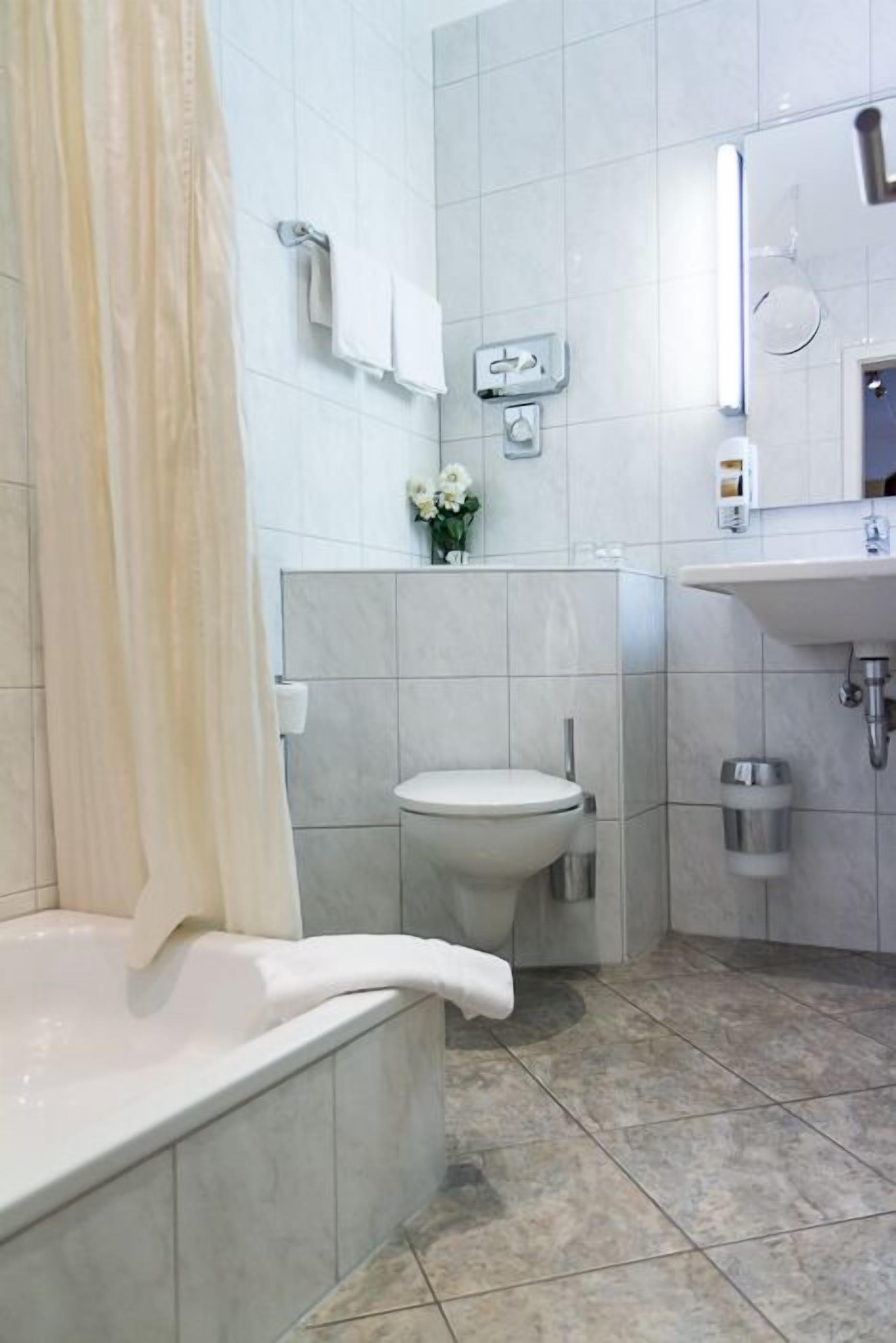 single room | bathroom | shower, hair dryer, towels