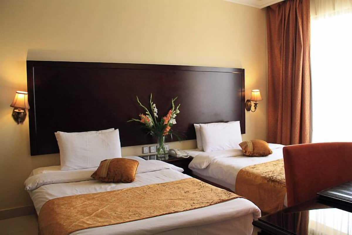 Economy Double or Twin Room | 1 bedroom, minibar, in-room safe, individually decorated