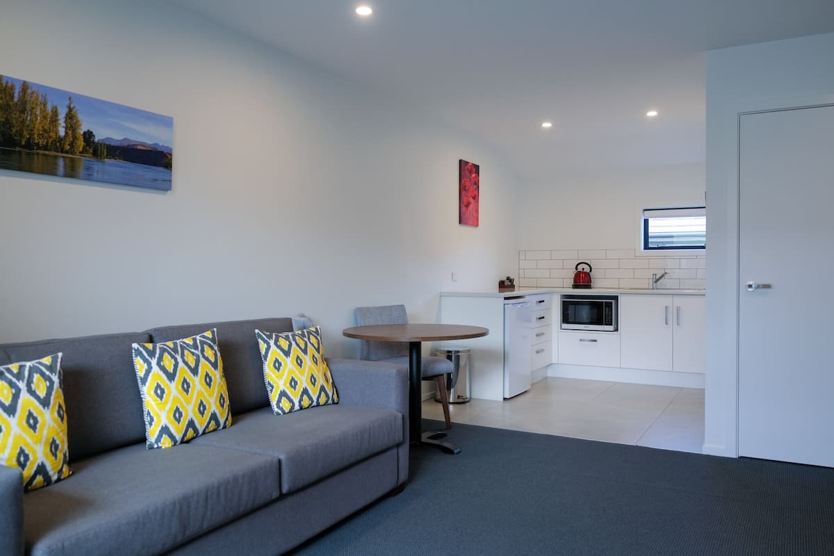 Family Room, 2 Bedrooms | Living area | 32-inch LCD TV with satellite channels, TV, heated floors