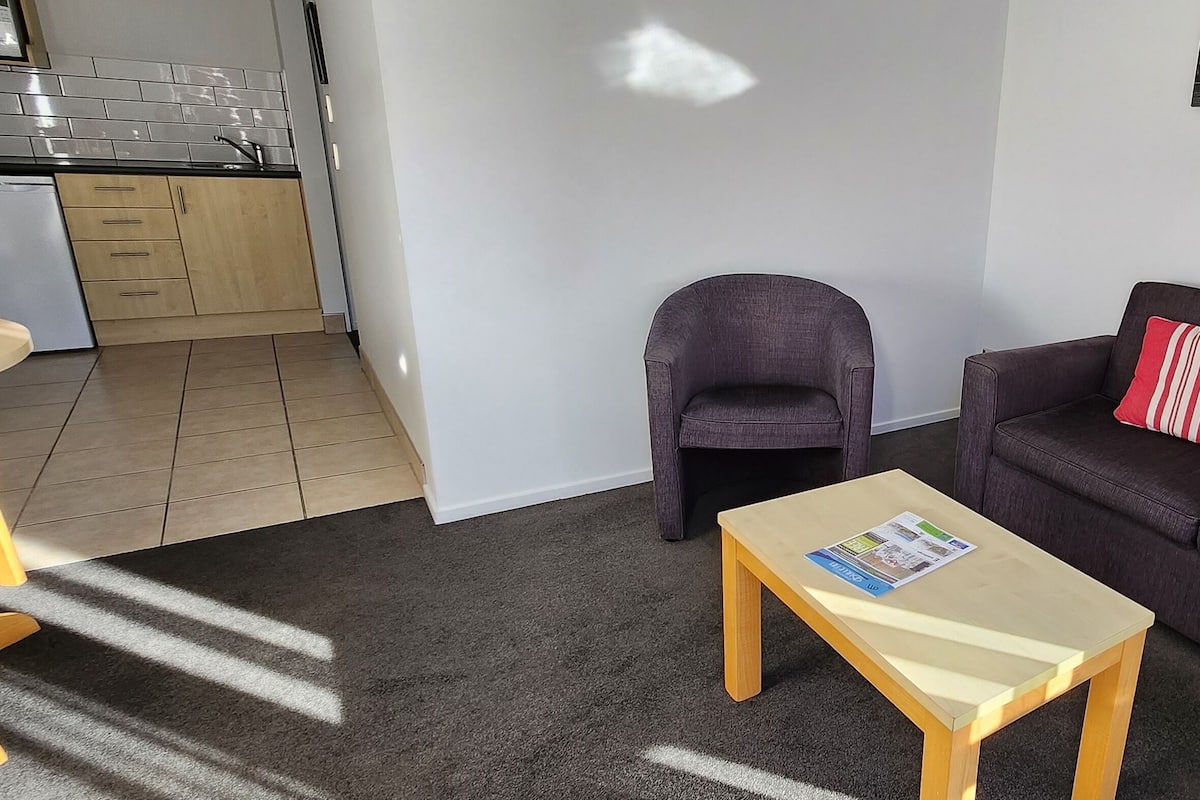 Standard Apartment, 1 Bedroom | Living area | 32-inch LCD TV with satellite channels, TV, heated floors