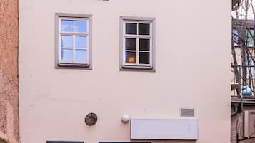 A hostel building with a sign reading "HOSTEL" above the entrance.