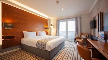 Executive Double Room | Desk, blackout curtains, iron/ironing board, free WiFi