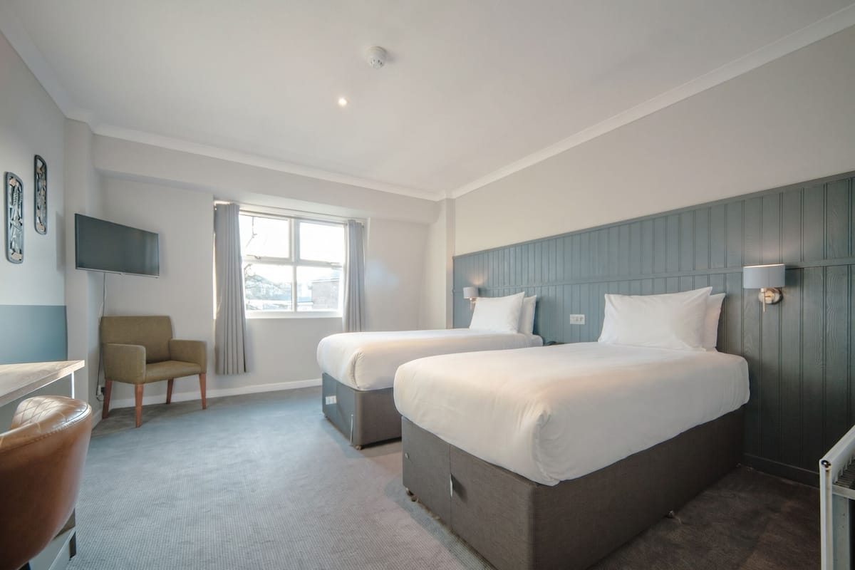 Desk, blackout curtains, iron/ironing board (on request), free WiFi