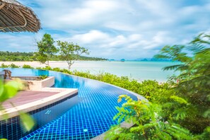 2 outdoor pools, pool umbrellas, sun loungers