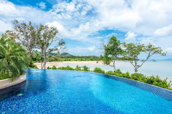 2 outdoor pools, pool umbrellas, sun loungers