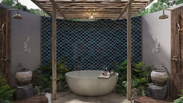 One Bedroom Beachfront Pool Villa | Bathroom | Shower, rainfall showerhead, free toiletries, hair dryer