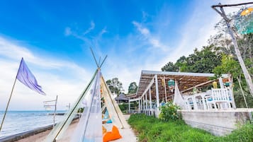 Enjoy a beachside retreat with a communal area and casual, outdoor accommodations.