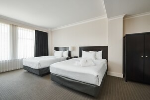 Superior Double Room, 2 Queen Beds | Living area | Flat-screen TV