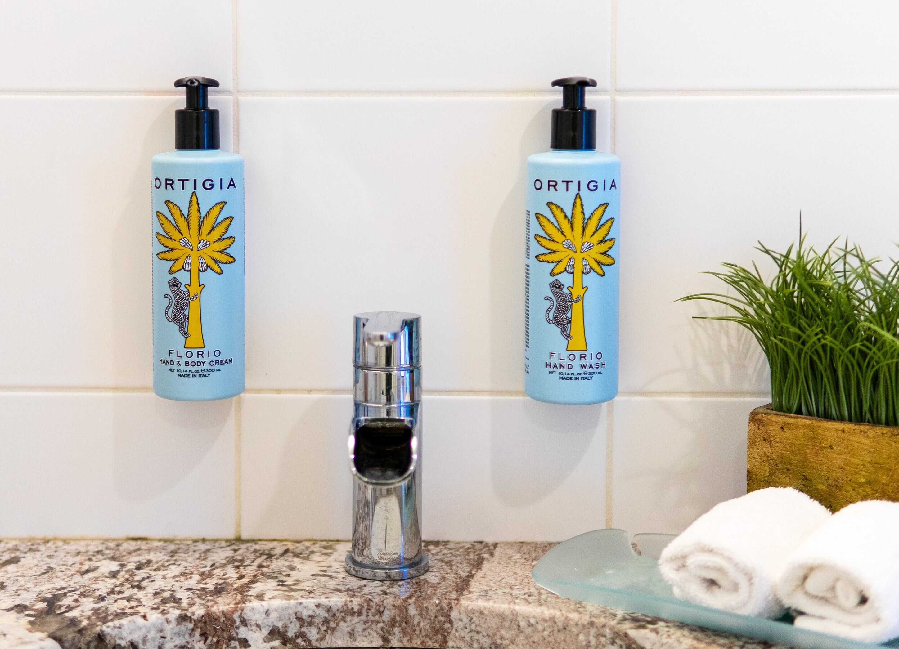 designer toiletries, hair dryer, bathrobes, towels