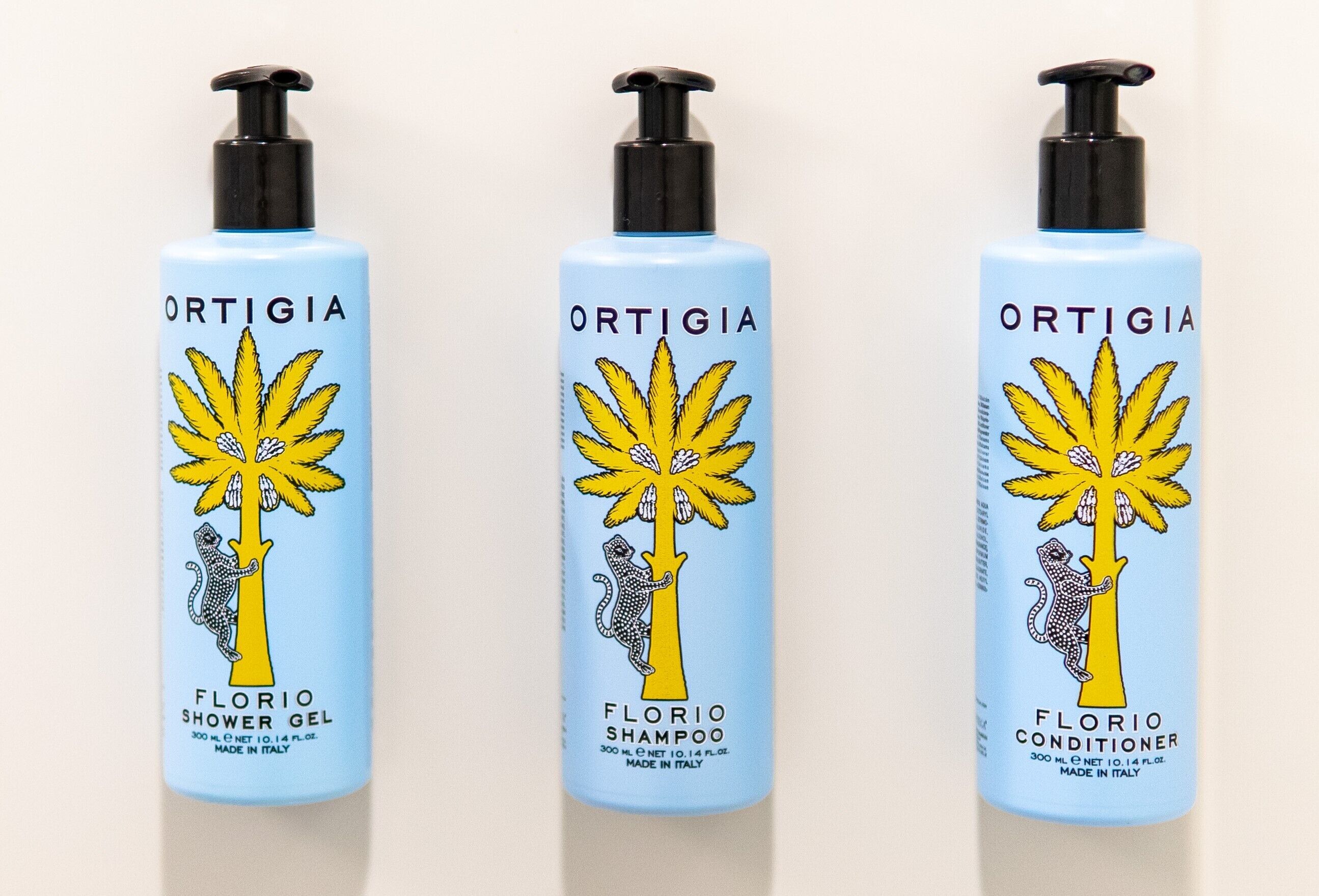 designer toiletries, hair dryer, bathrobes, towels