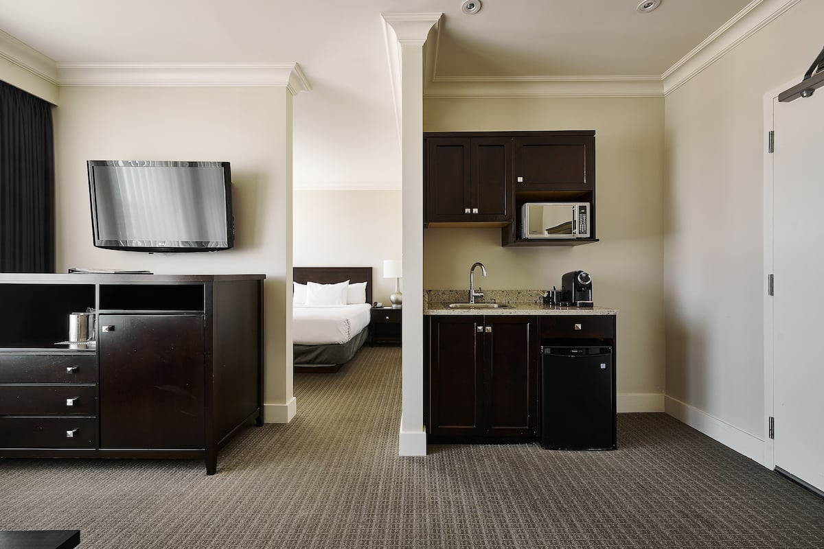 Junior Suite, 1 King Bed | Living area | Flat-screen TV