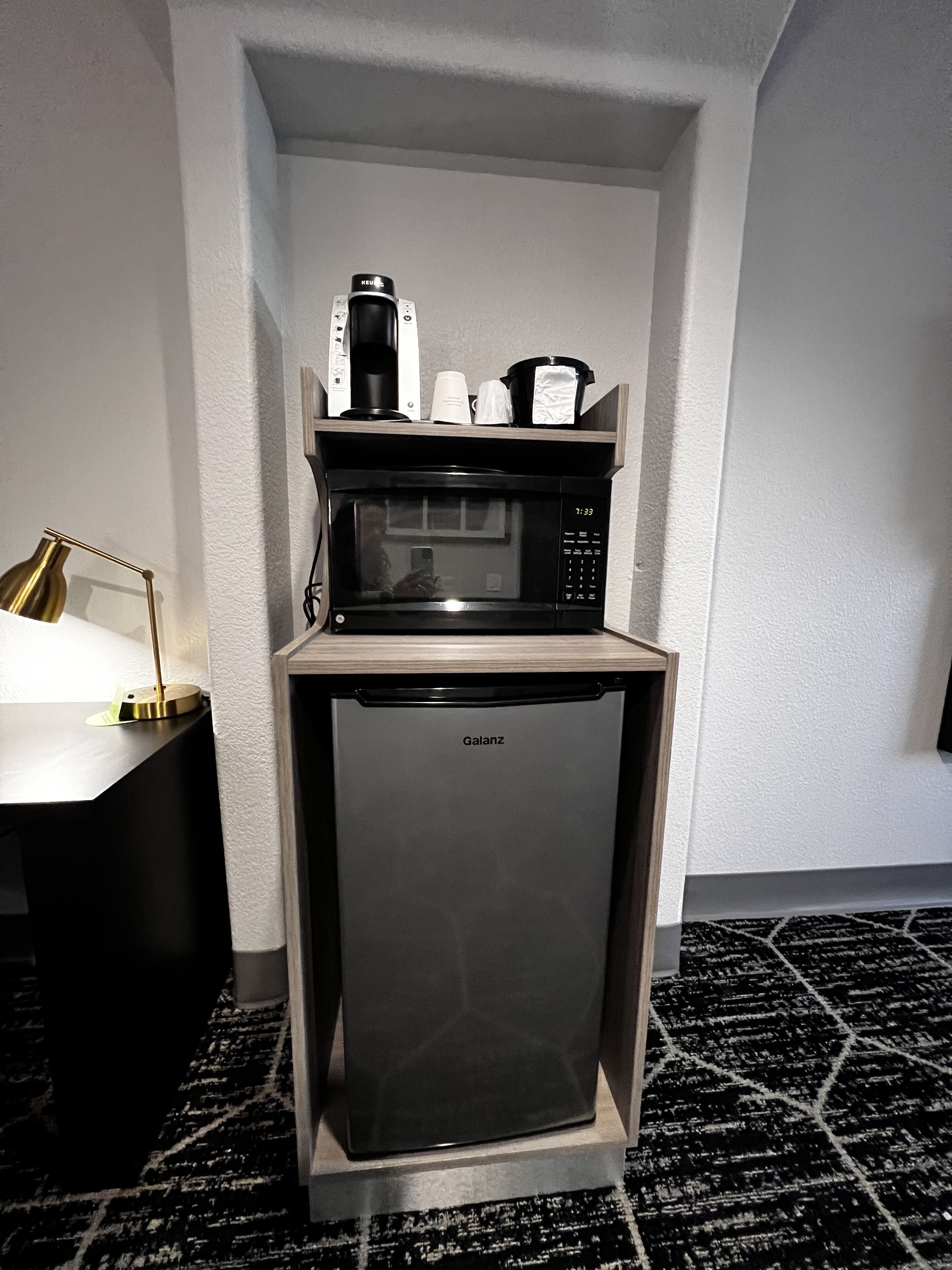 premium bedding, desk, laptop workspace, blackout curtains