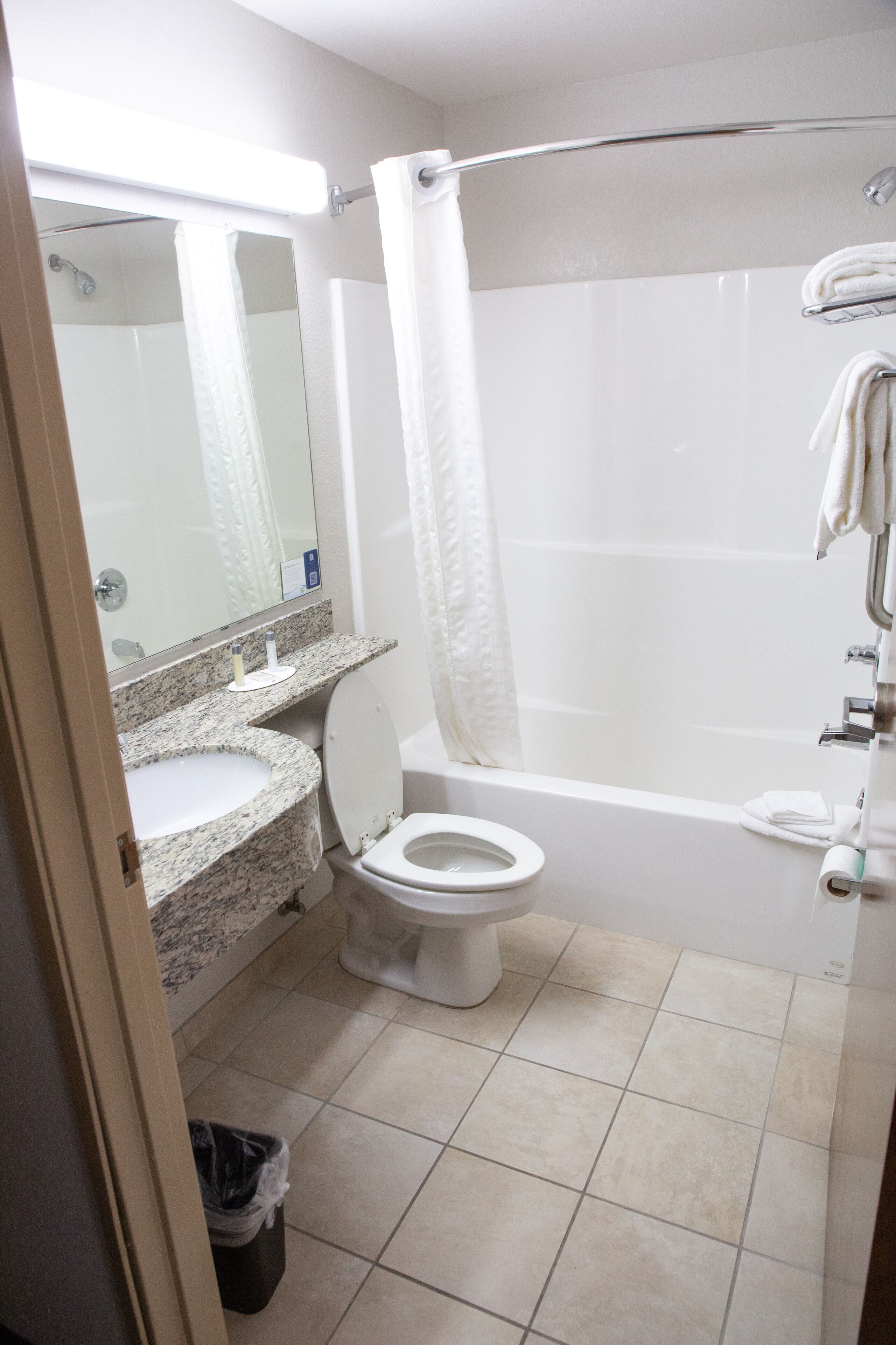 combined shower/bathtub, free toiletries, hair dryer, towels