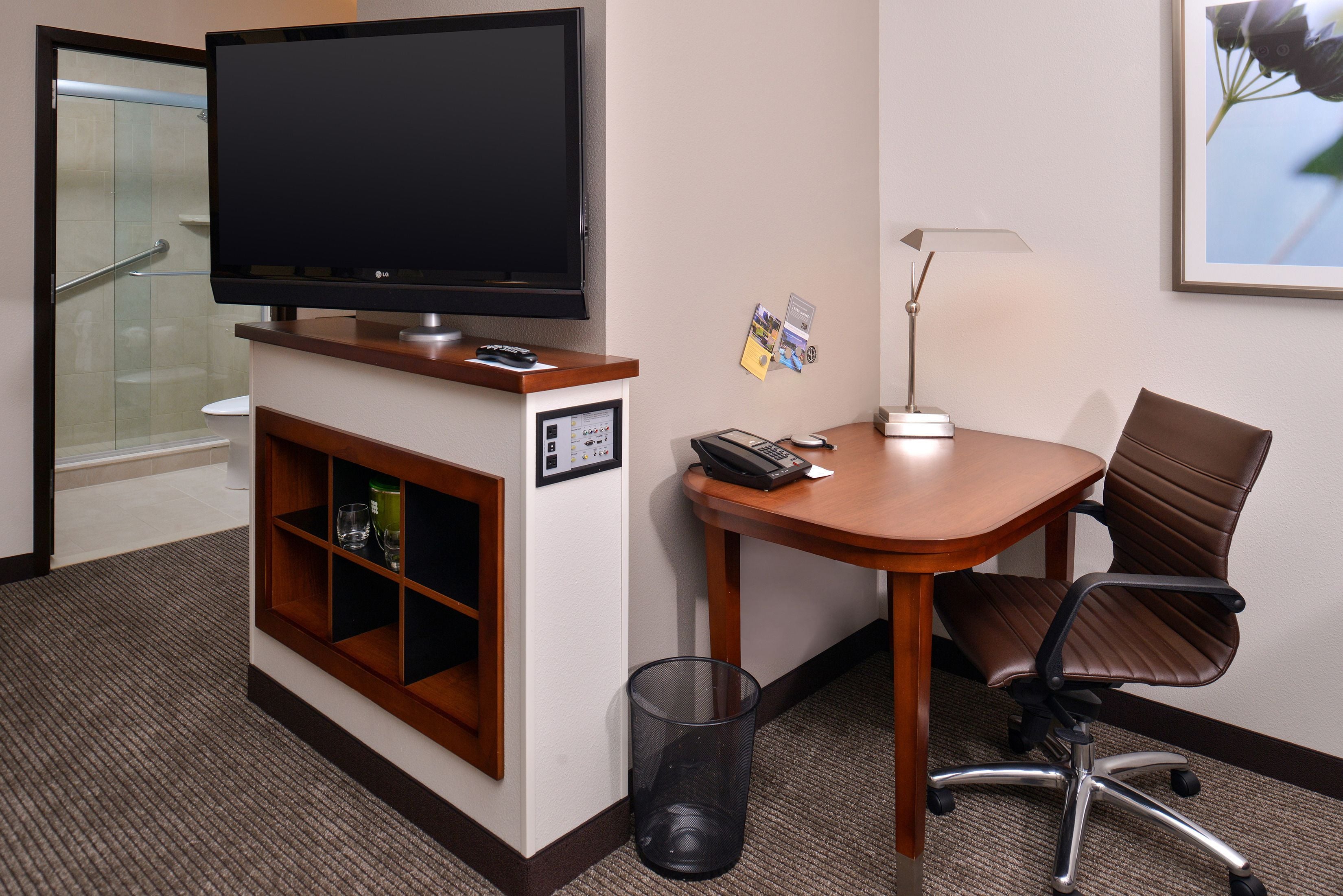 desk, laptop workspace, blackout curtains, iron/ironing board
