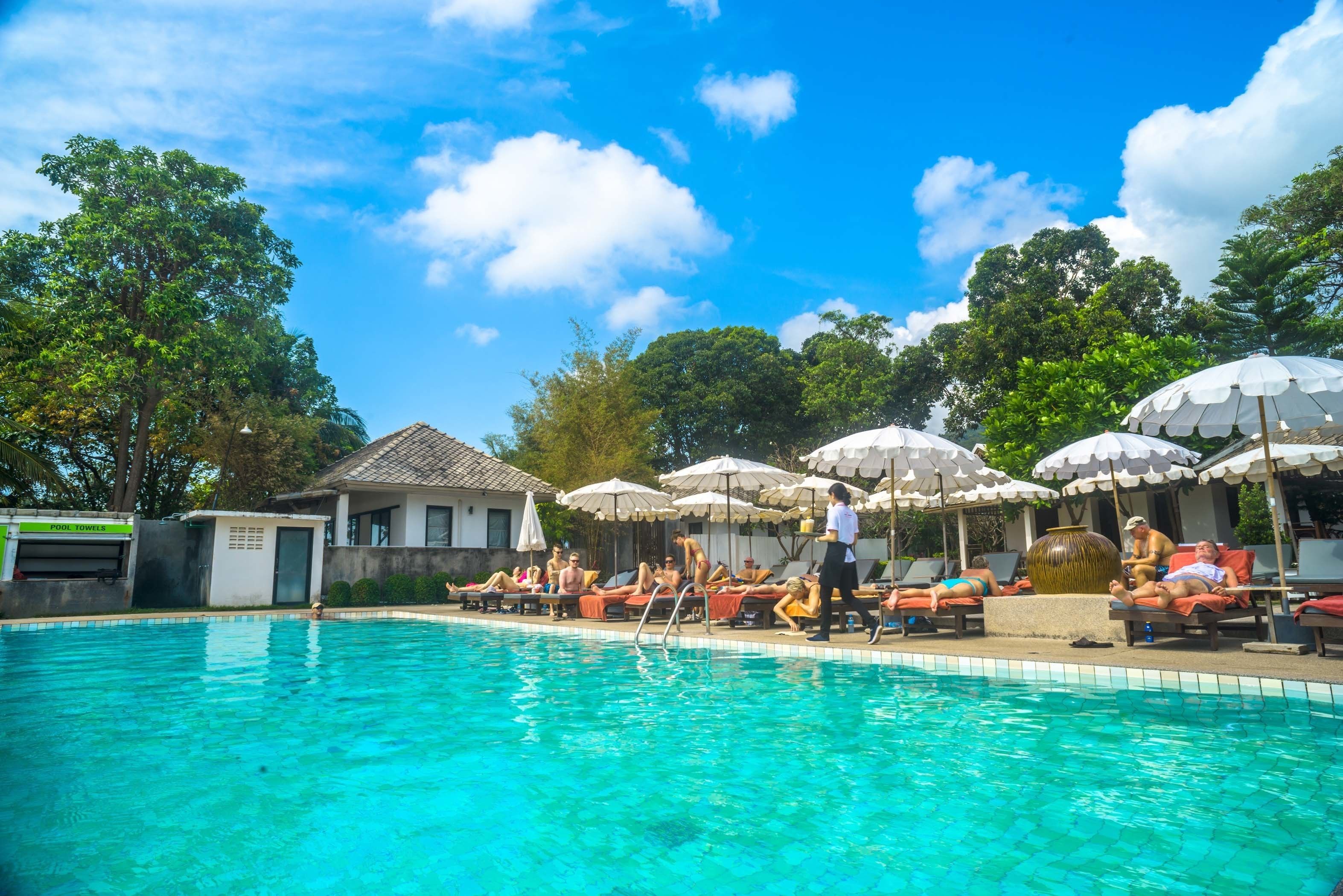 Outdoor pool, pool umbrellas, sun loungers