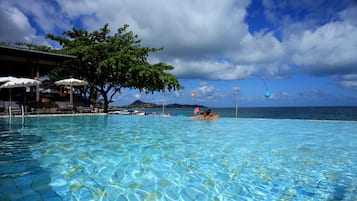 Outdoor pool, pool umbrellas, sun loungers