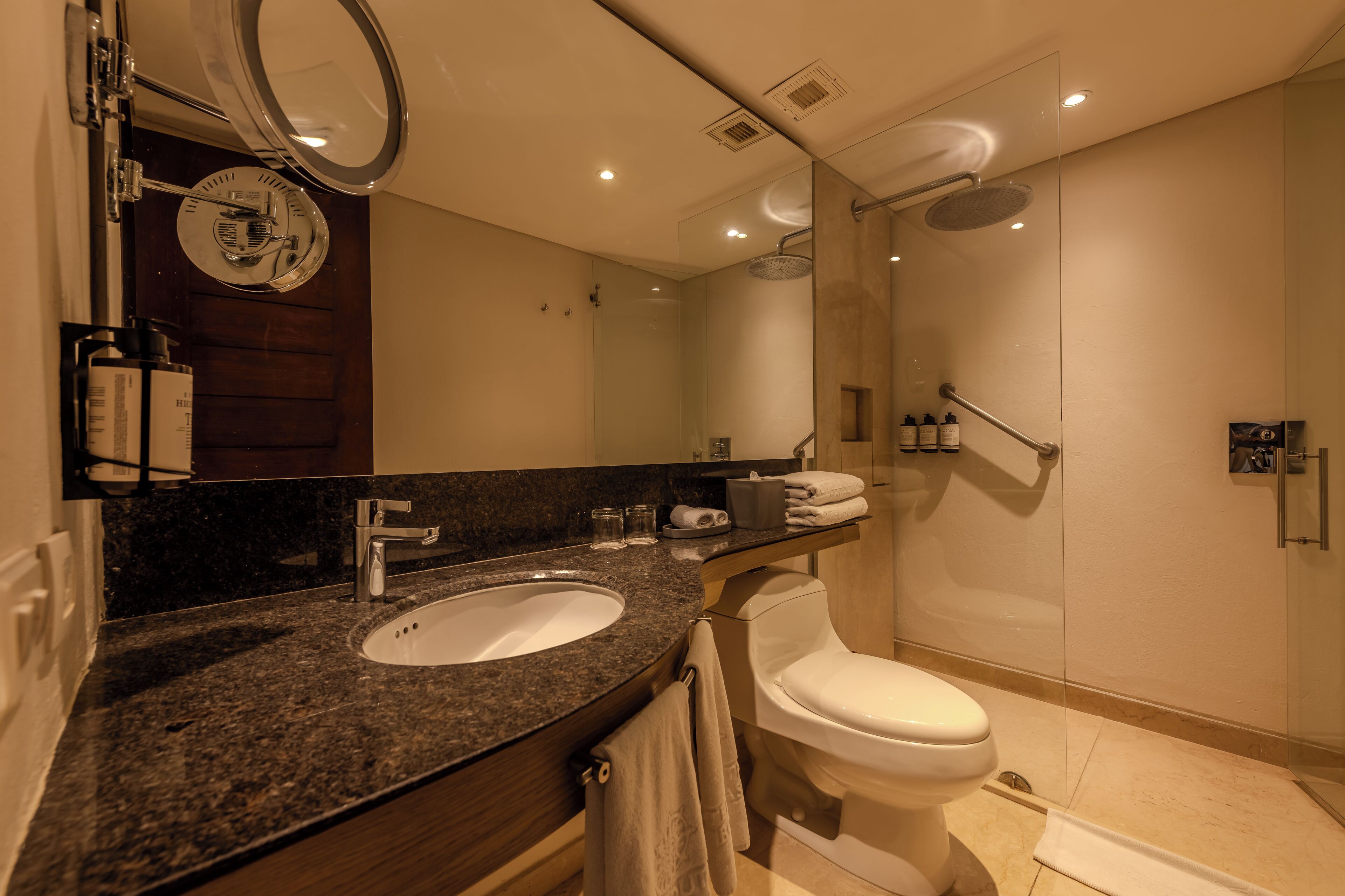 family suite (duplex) | bathroom | shower, rainfall showerhead, hair dryer, bathrobes