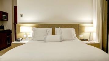 2 sovrum, sängtillbehör av högsta kvalitet, duntäcken och minibar