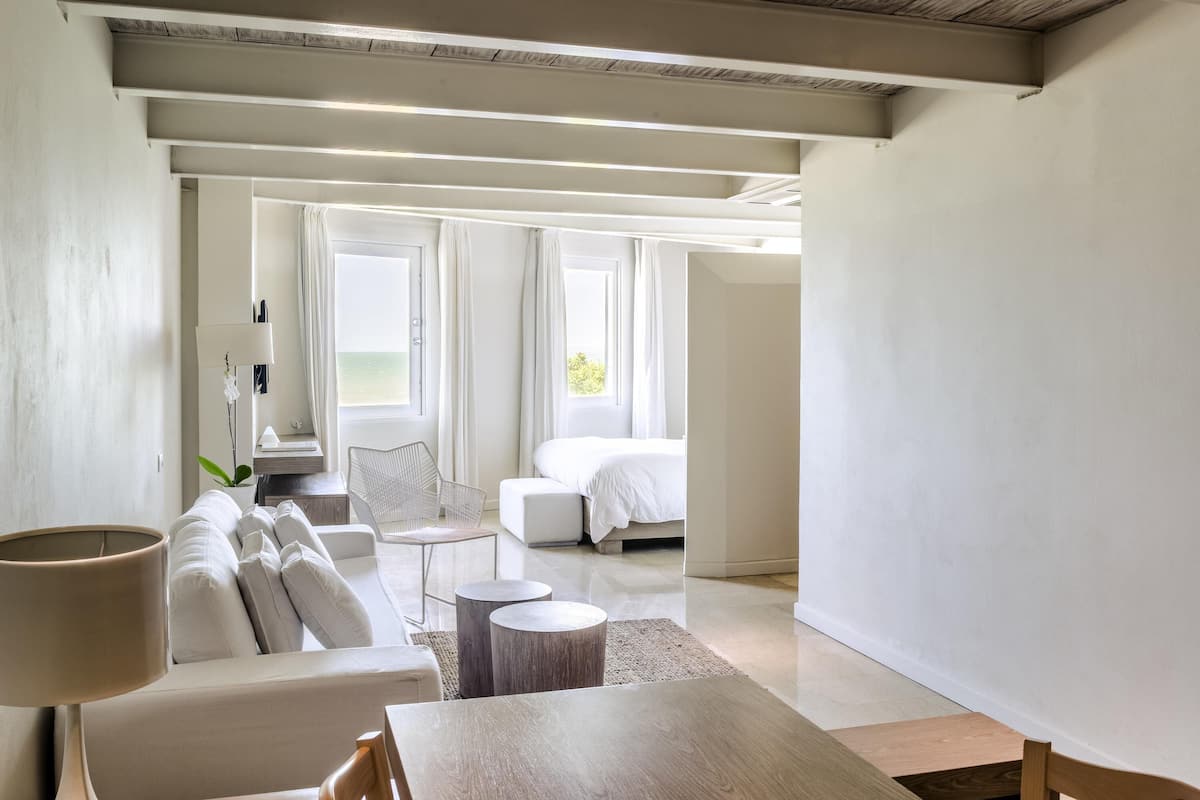 family suite, 1 king bed, sea view (duplex) | 2 bedrooms, premium bedding, down duvets, minibar