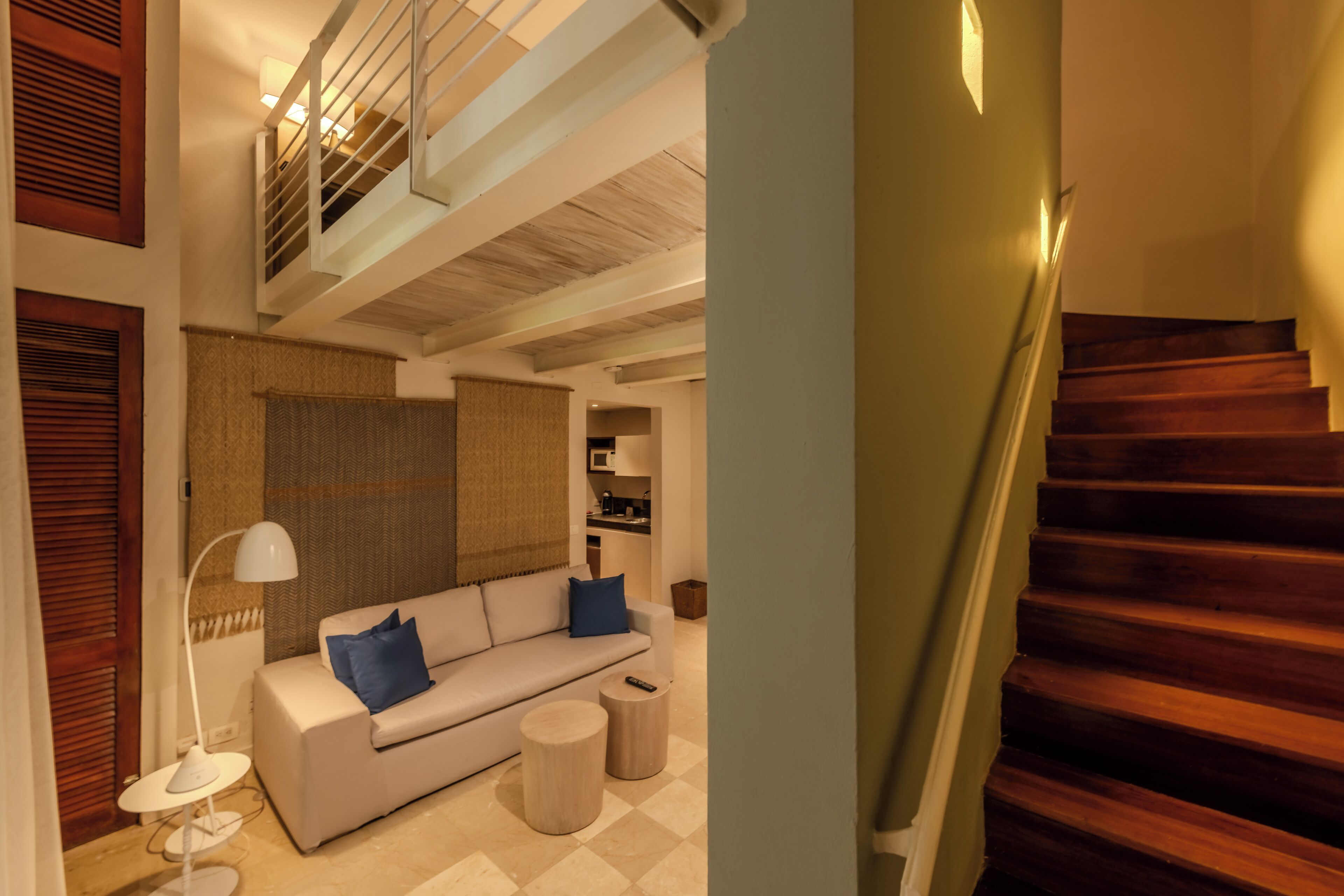 duplex, 1 queen bed with sofa bed | living area | 43-inch led tv with cable channels, tv, ipod dock