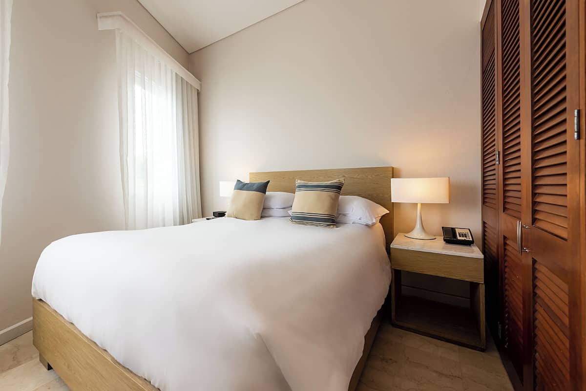Deluxe Room, 1 Queen Bed, Sea View | 2 bedrooms, premium bedding, down comforters, minibar