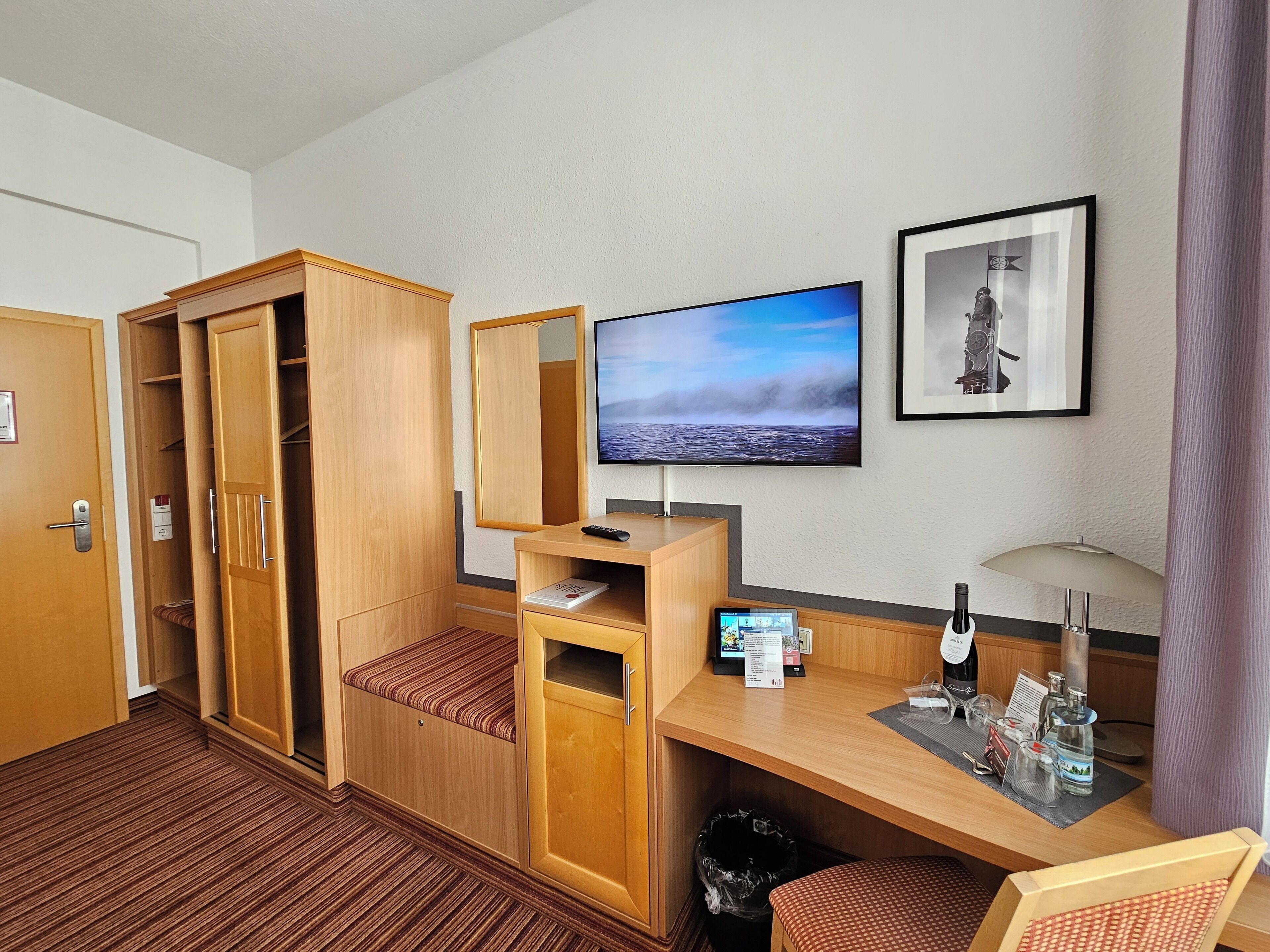 economy double room | living area | tablet