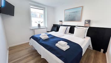 Familieværelse til 4 personer (+) | 2 soveværelser, individuelt design, individuel indretning, skrivebord