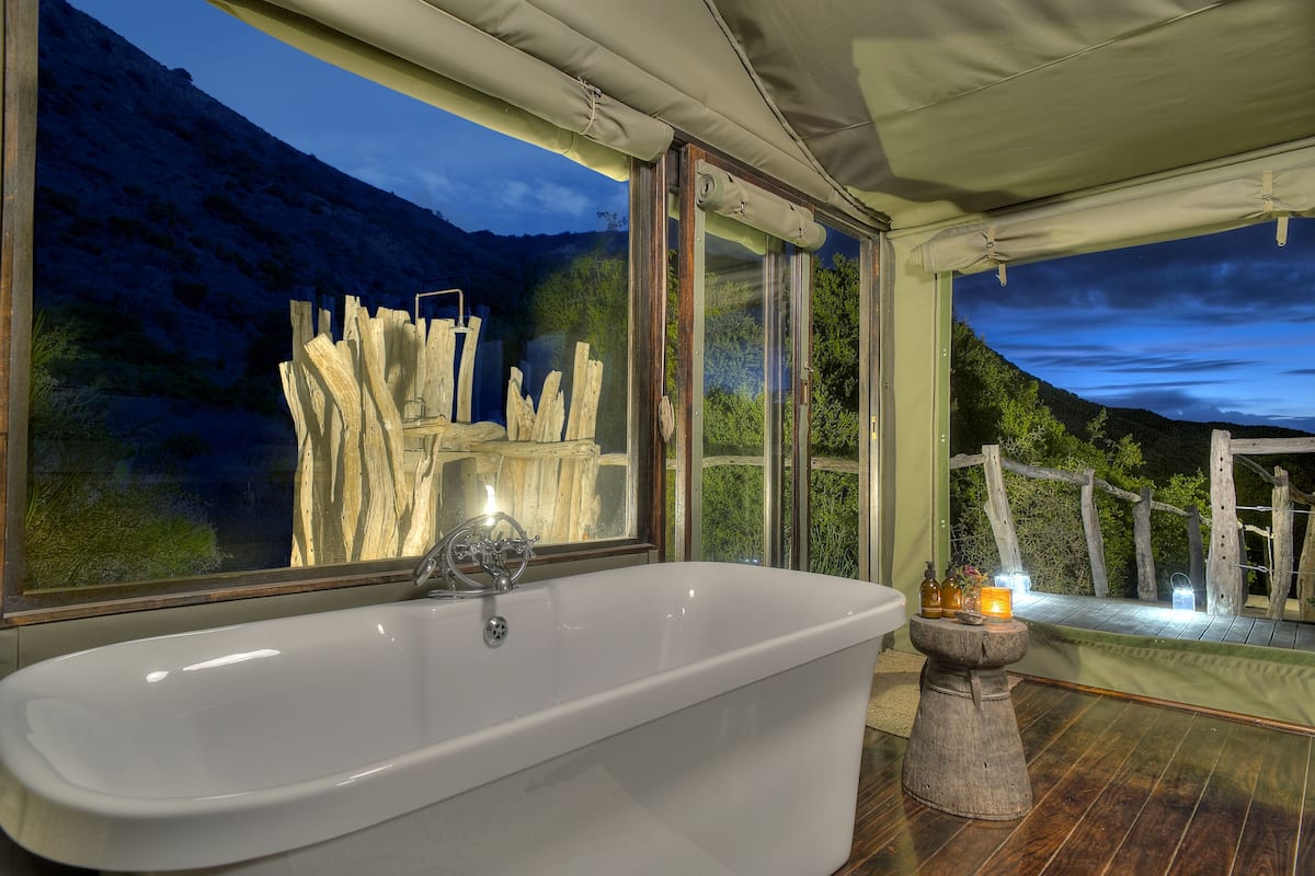 separate bathtub and shower, deep-soaking bathtub, designer toiletries