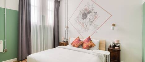 Premium bedding, blackout curtains, iron/ironing board, free WiFi