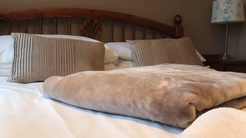 Premium bedding, individually furnished, desk, laptop workspace