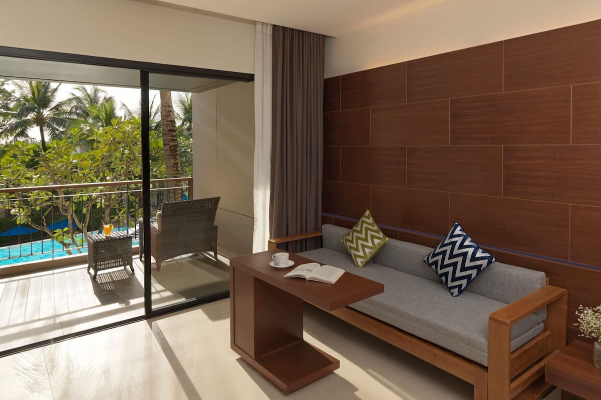 Deluxe Room, Balcony, Pool View (1 King Bed and 1 Sofabed) | 1 bedroom, hypo-allergenic bedding, down comforters, memory foam beds