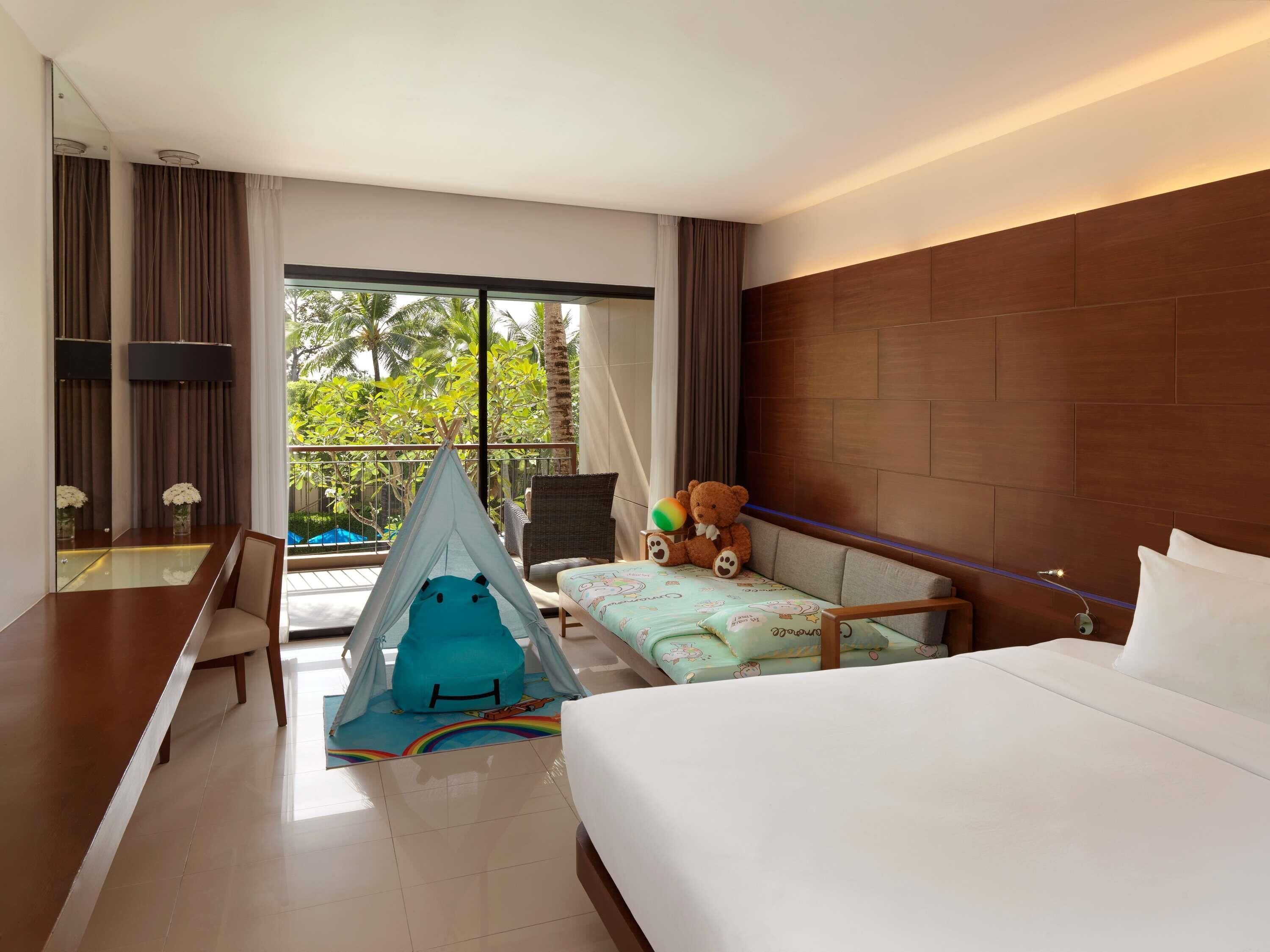Deluxe Room, Balcony, Pool View (1 King Bed and 1 Sofabed) | Down duvets, in-room safe, desk, laptop workspace