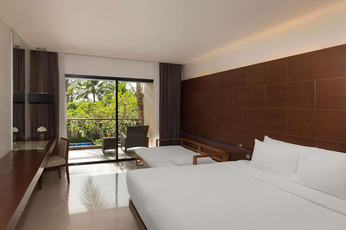 Deluxe Room, Balcony, Pool View (1 King Bed and 1 Sofabed) | Down comforters, in-room safe, desk, laptop workspace