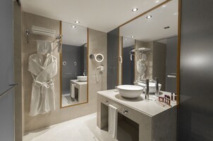 Shower, designer toiletries, hair dryer, bathrobes