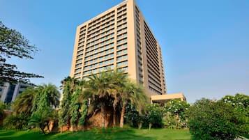 Experience the contemporary design of this hotel, surrounded by lush greenery and offering a range of amenities.