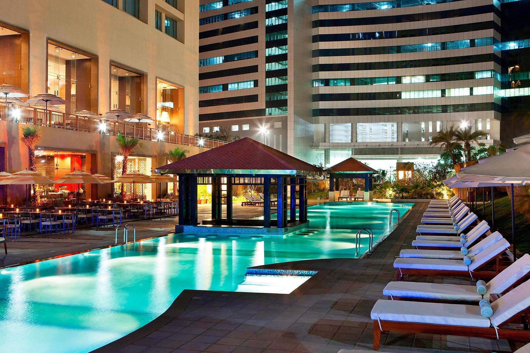Outdoor pool, open 6:00 AM to 8:00 PM, pool umbrellas, pool loungers