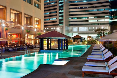 Outdoor pool, open 6:00 AM to 8:00 PM, pool umbrellas, sun loungers