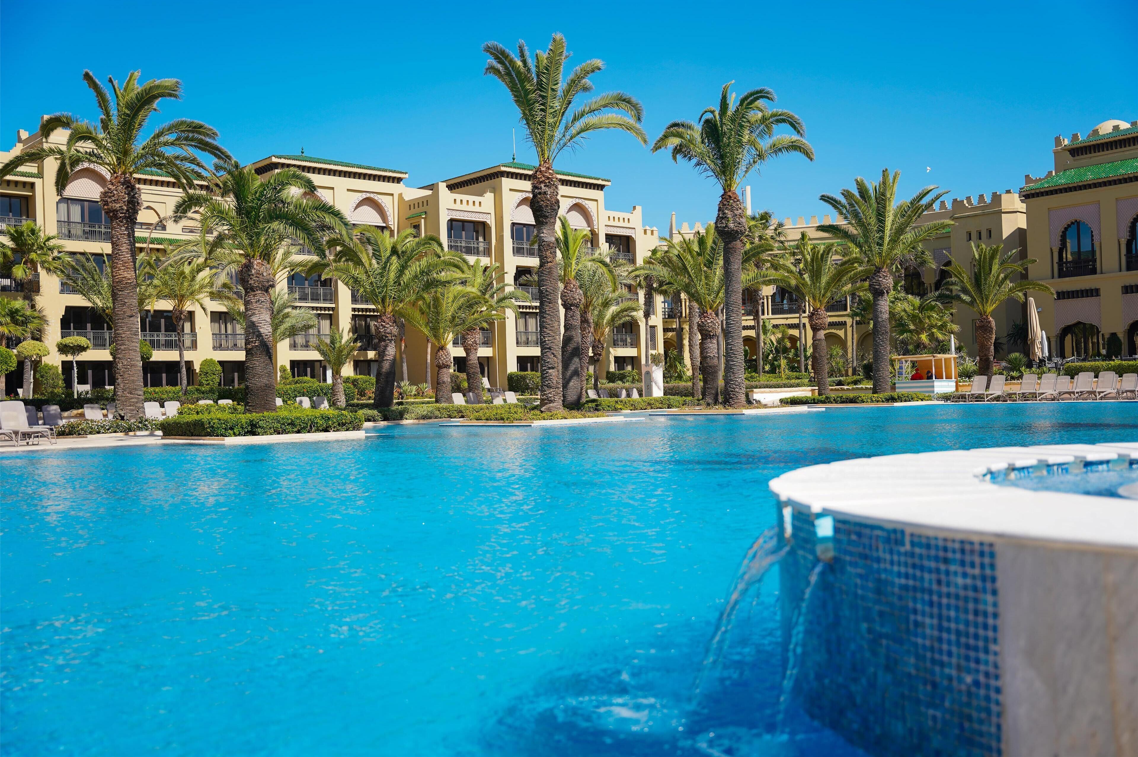 2 outdoor pools, pool umbrellas, pool loungers