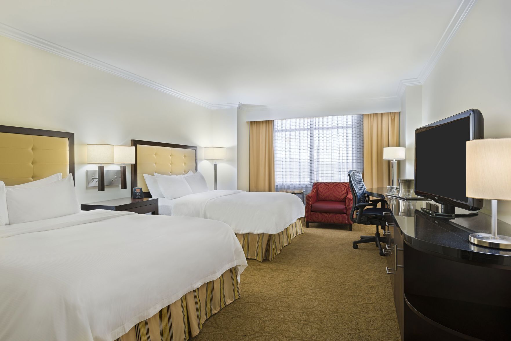 Hypo-allergenic bedding, pillowtop beds, in-room safe, desk