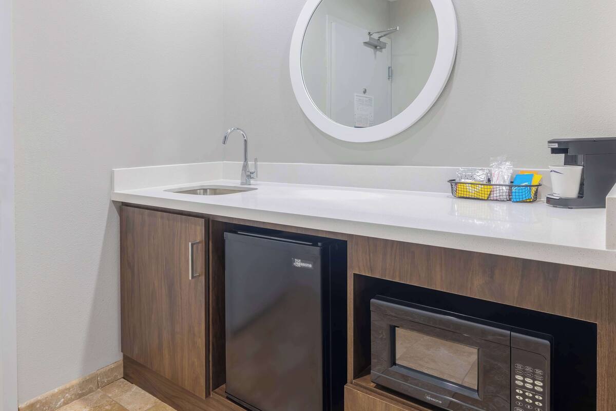 pillow-top beds, blackout curtains, iron/ironing board