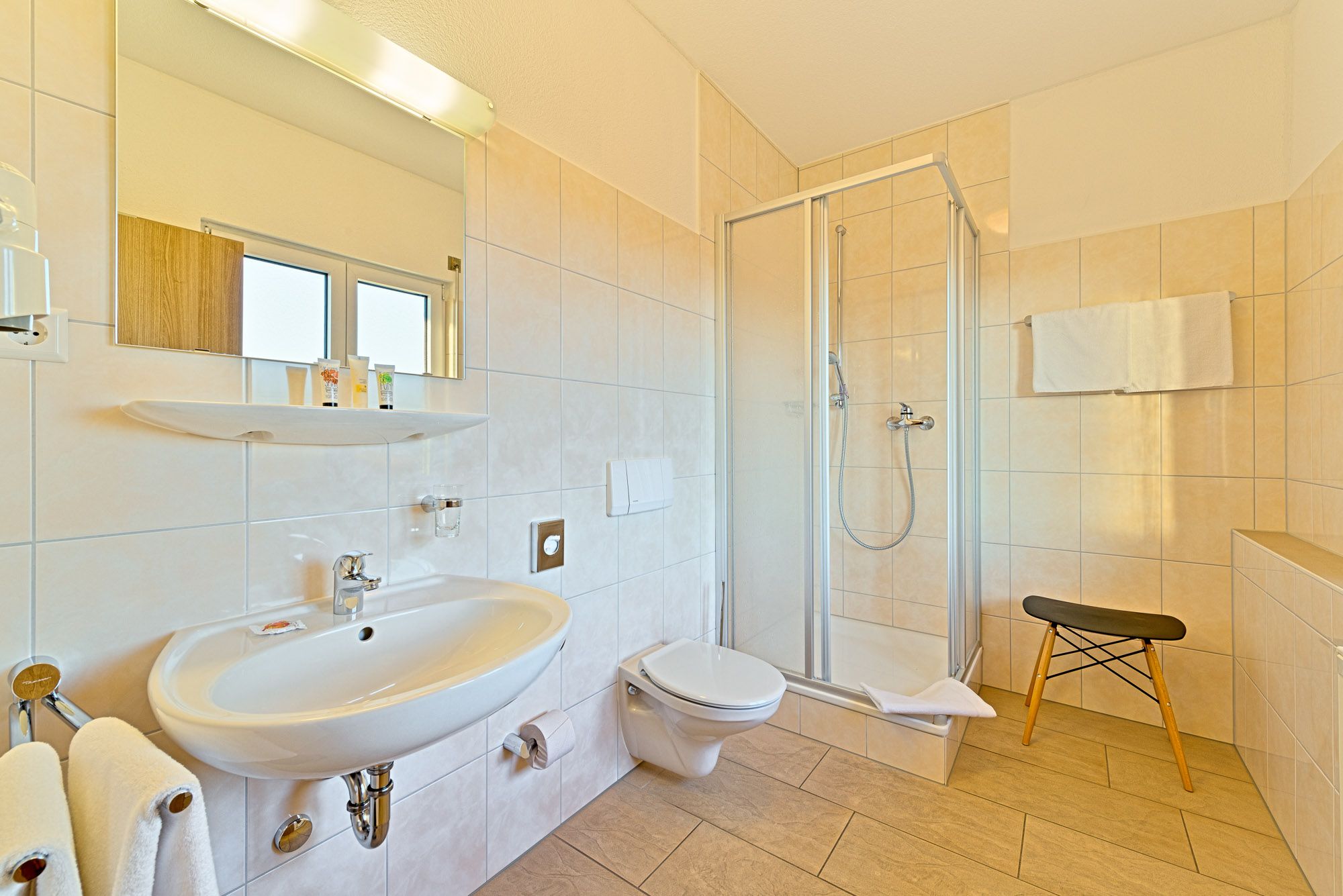 shower, free toiletries, hair dryer, towels