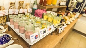 A buffet with various food items and condiments. - St. Fridolin (Bad Saeckingen)