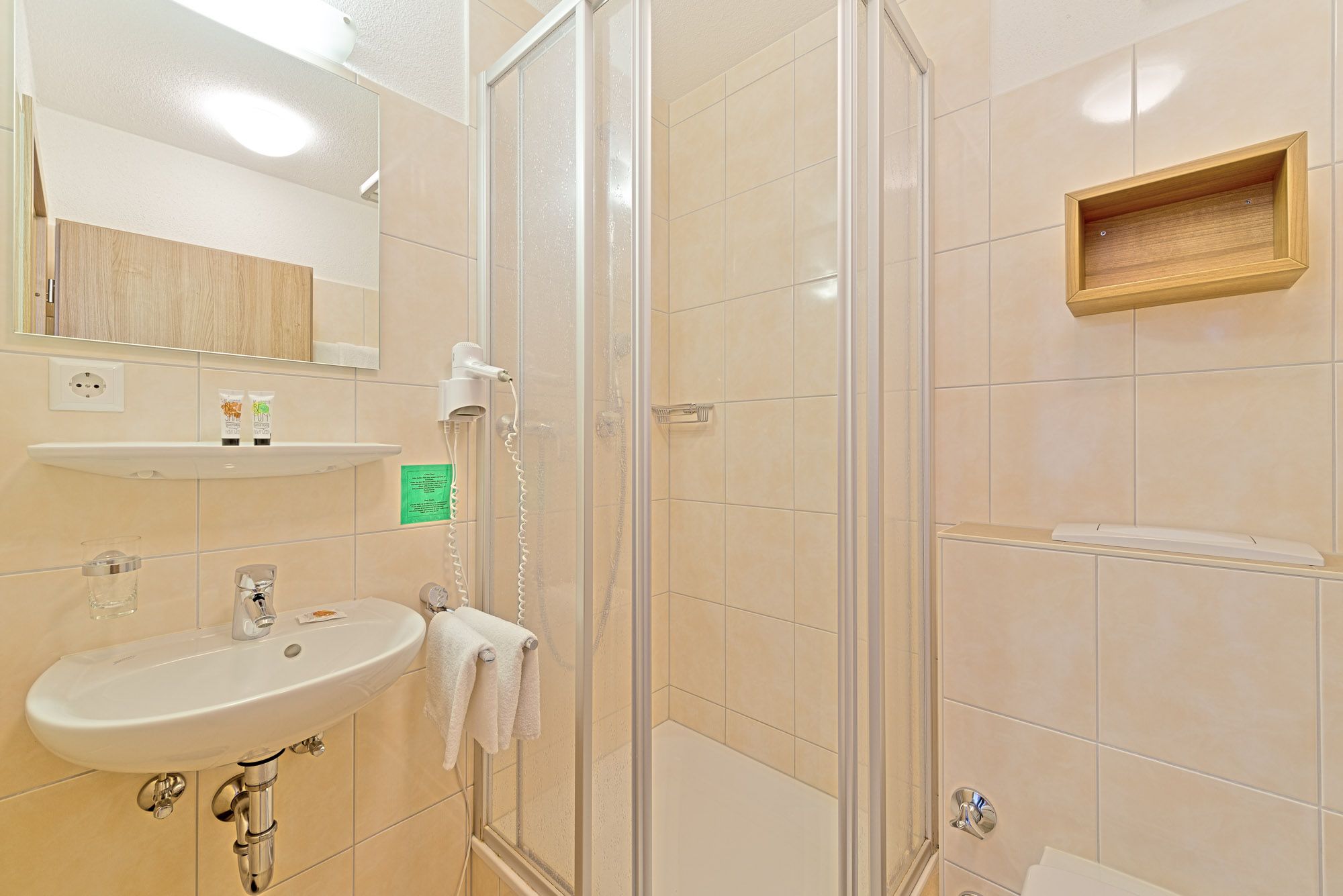 shower, free toiletries, hair dryer, towels