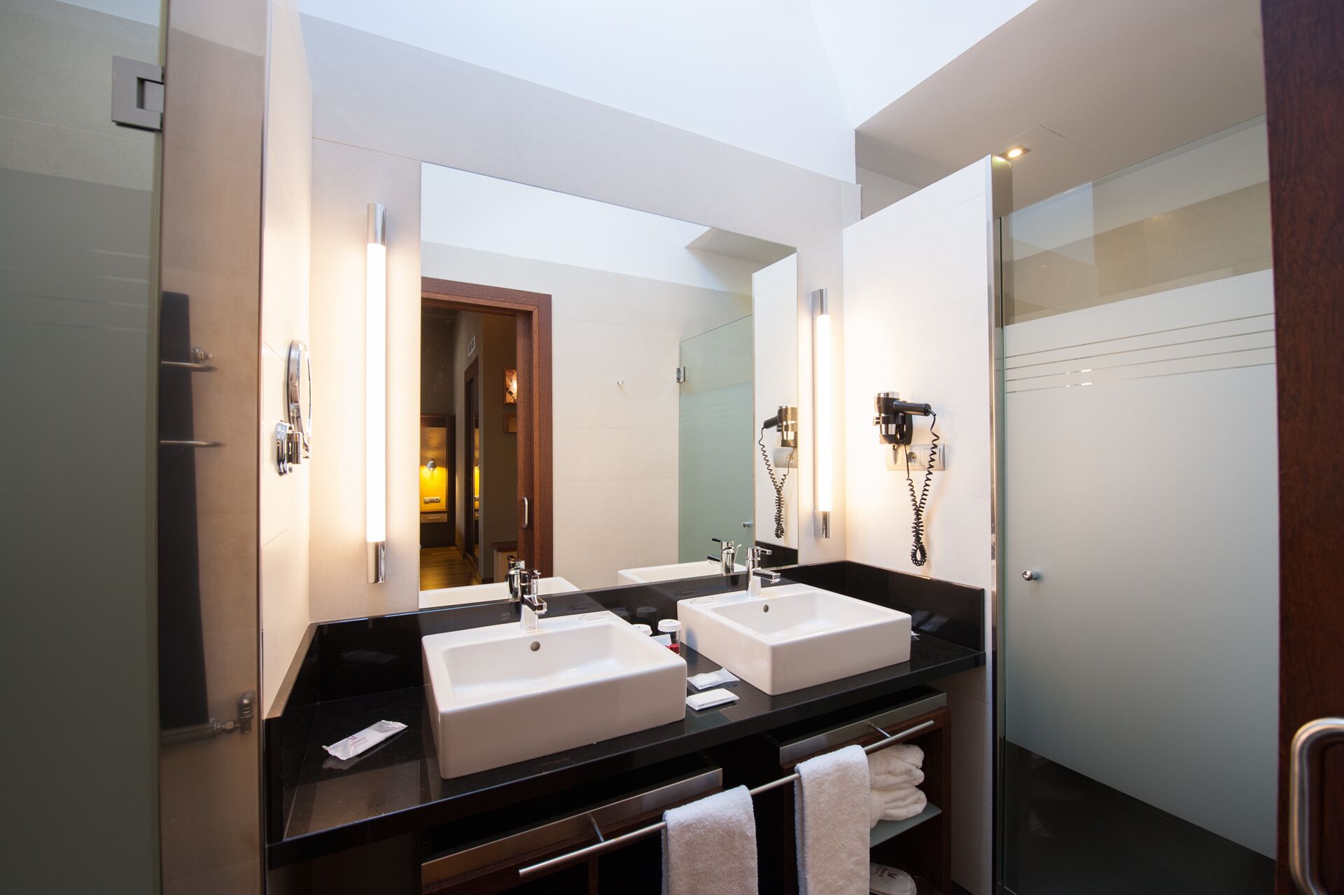 deep-soaking bathtub, free toiletries, hair dryer, bathrobes