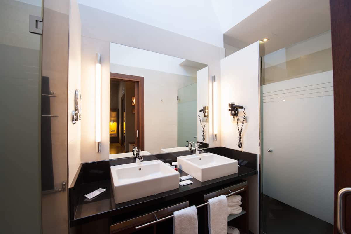 deep-soaking bathtub, free toiletries, hair dryer, bathrobes