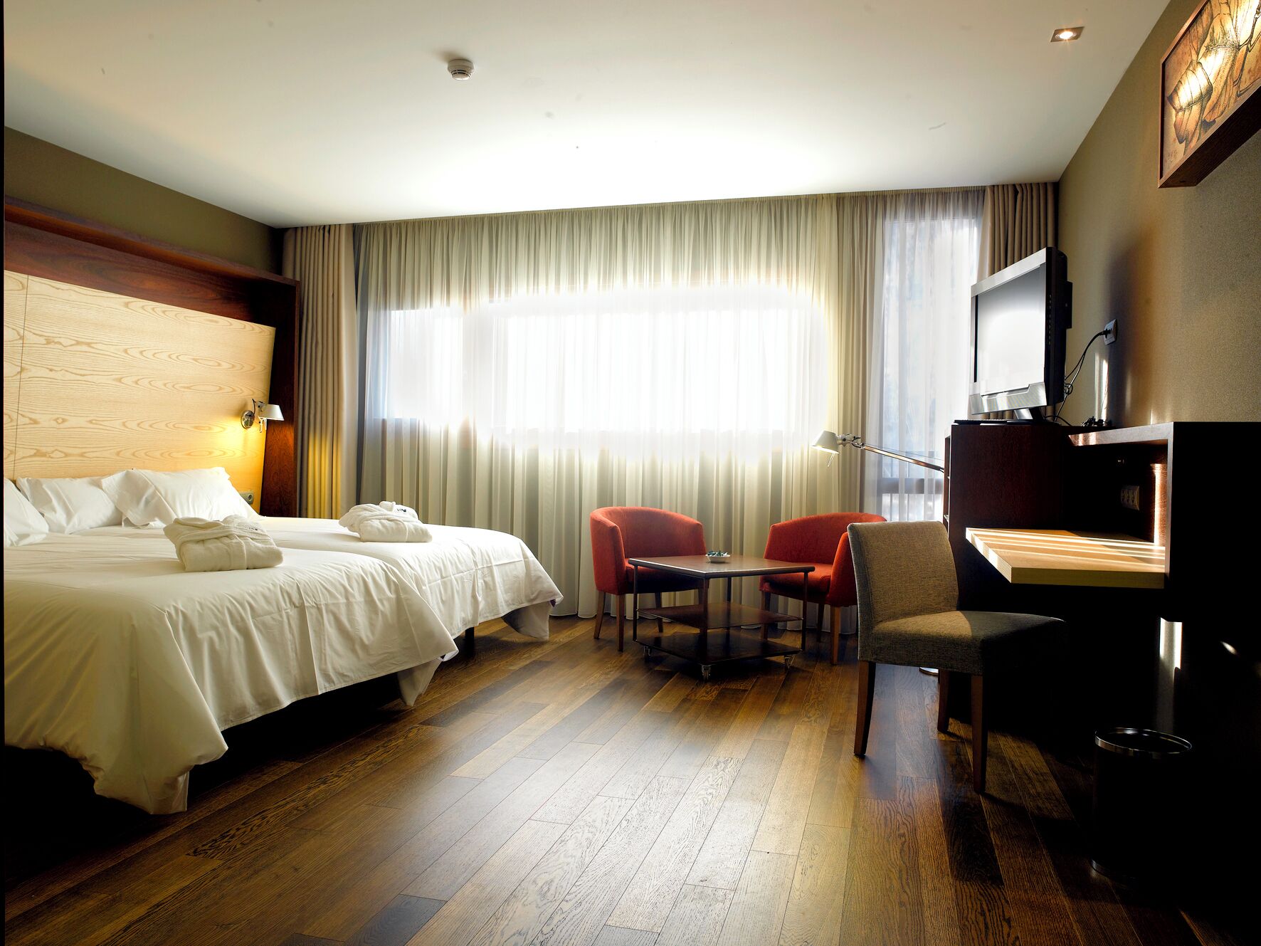 Premium bedding, down duvets, pillow-top beds, minibar