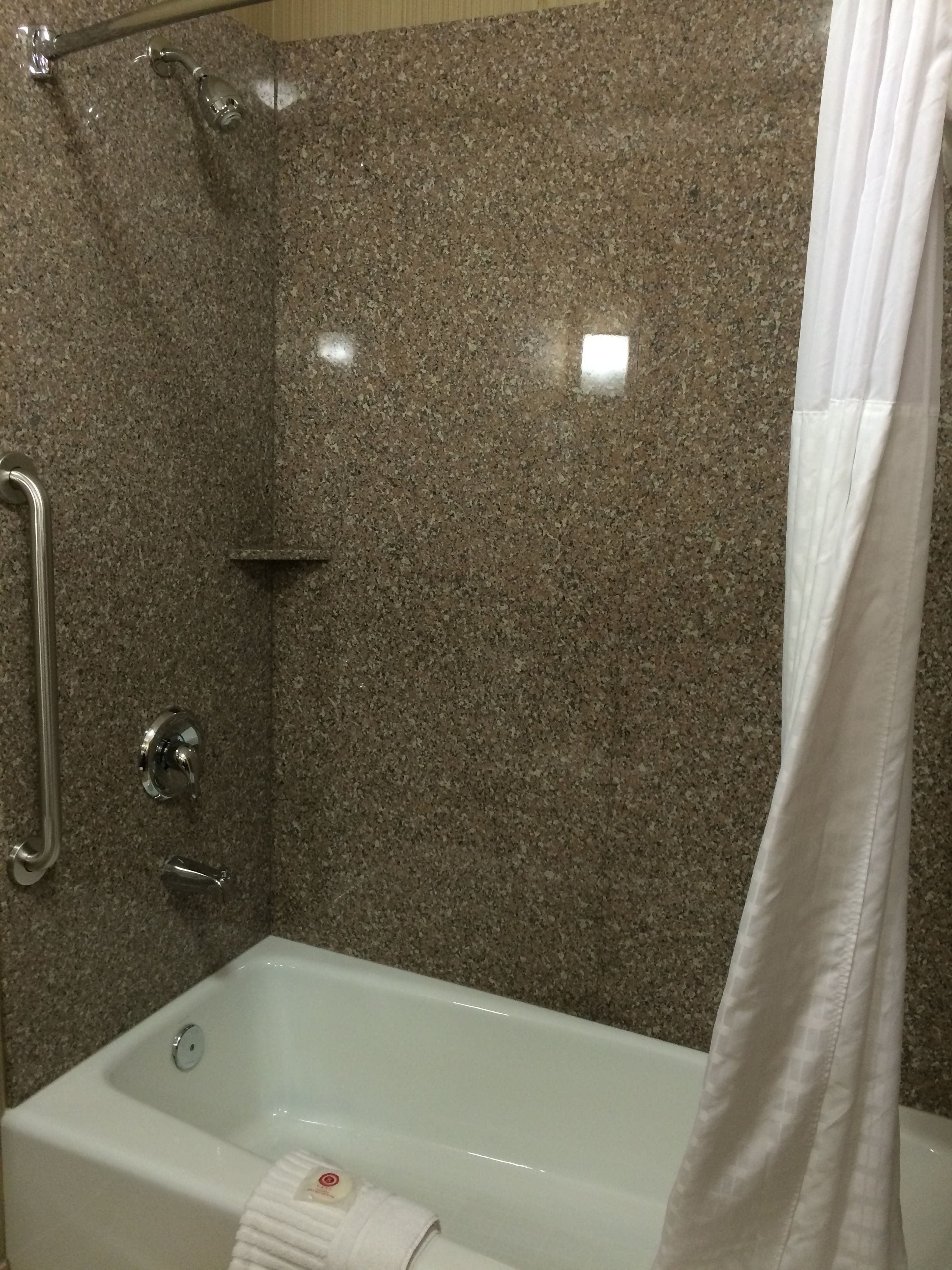 combined shower/bathtub, free toiletries, hair dryer, towels